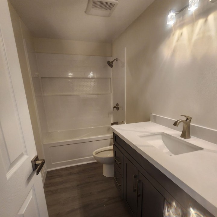 Bathroom With Tubs And Large Vanity