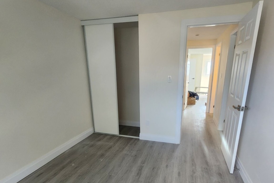 Bedroom Showing Door And Closet