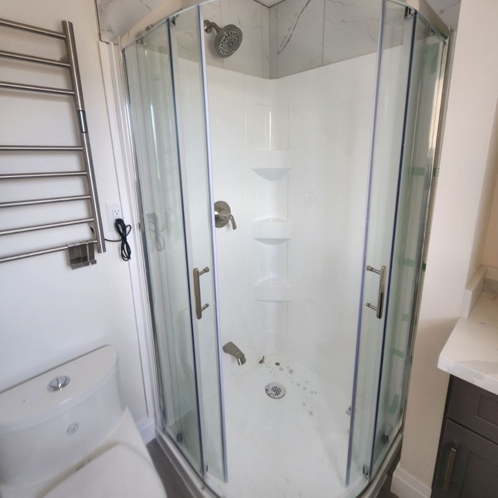 Shower Stall And Toilet