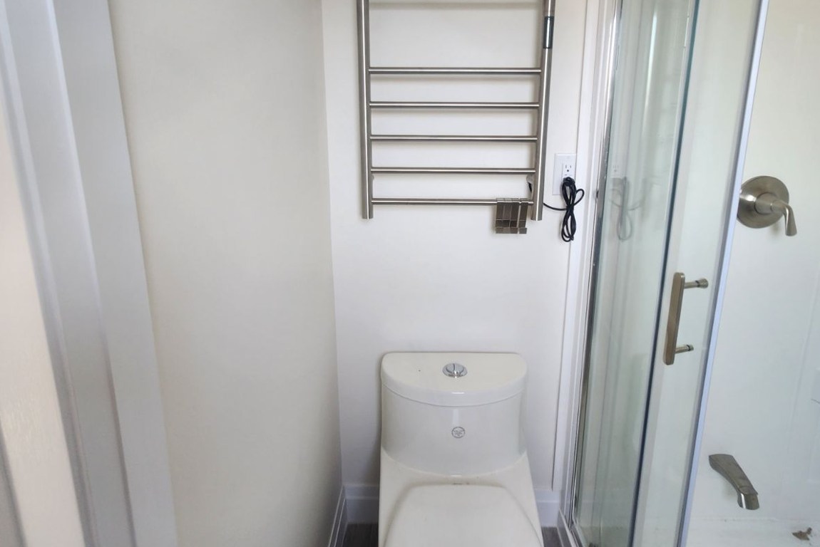 Shower Stall and Toilet