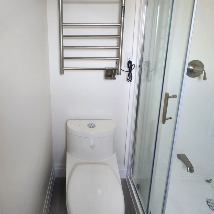 Shower Stall and Toilet